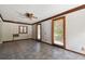 Living room with tile floors, window, and A/C unit at 1618 Valencia St, Clearwater, FL 33756