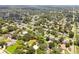 Aerial view of the property's location in a residential neighborhood with mature trees at 1618 Valencia St, Clearwater, FL 33756