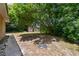 Backyard with shed and mature trees at 1618 Valencia St, Clearwater, FL 33756