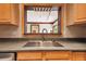 Stainless steel kitchen sink with granite countertop at 1618 Valencia St, Clearwater, FL 33756