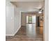 Open living area with wood-look floors and access to other rooms at 1618 Valencia St, Clearwater, FL 33756