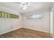 Spacious bedroom with wood-look flooring and ceiling fan at 1618 Valencia St, Clearwater, FL 33756