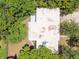 Aerial view showing the house's roof and surrounding trees at 1618 Valencia St, Clearwater, FL 33756