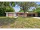 Mid-century modern home with a spacious yard at 1618 Valencia St, Clearwater, FL 33756