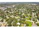 Aerial view of neighborhood, showing property near water and main road at 1618 Valencia St, Clearwater, FL 33756