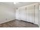 Bright bedroom with wood-look floors and neutral walls at 1618 Valencia St, Clearwater, FL 33756