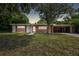 Mid-century ranch home with carport at 1618 Valencia St, Clearwater, FL 33756