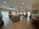 Spacious community room with seating and tables at 2994 Mission E Dr, Clearwater, FL 33759