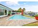 Stunning pool and patio with water access at 5690 Bayview Dr, Seminole, FL 33772