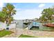 Private dock with boat lift and water access at 5690 Bayview Dr, Seminole, FL 33772