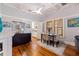 Bright dining area with hardwood floors and view into kitchen at 407 10Th Ne Ave, St Petersburg, FL 33701