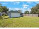 Large backyard with detached garage and fenced area at 751 90Th N Ave, St Petersburg, FL 33702