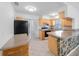Kitchen with wood cabinets, an island and an eat in area at 751 90Th N Ave, St Petersburg, FL 33702