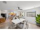 Elegant dining room with modern furniture and light wood flooring at 751 90Th N Ave, St Petersburg, FL 33702