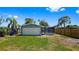 Large backyard with detached garage and fenced area at 751 90Th N Ave, St Petersburg, FL 33702