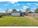 Large backyard with detached garage and fenced area at 751 90Th N Ave, St Petersburg, FL 33702