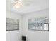 Bright bedroom with window blinds and ceiling fan at 751 90Th N Ave, St Petersburg, FL 33702