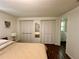 Bedroom featuring closet space and an ensuite bathroom at 1503 Edna Ave Nw, Largo, FL 33770