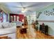 Spacious living room with a white couch and a view into the dining area at 192 Blue Marlin Dr, Oldsmar, FL 34677