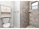 Simple bathroom with shower and white toilet at 102 Shore W Dr, Oldsmar, FL 34677