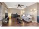 Living room featuring hardwood floors, neutral decor, and ample natural light at 2036 Forest Dr, Clearwater, FL 33763