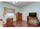 Bedroom with wood furniture and a TV at 192 Blue Marlin Dr, Oldsmar, FL 34677