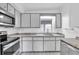 Updated kitchen featuring stainless steel appliances and granite countertops at 4430 14Th N Ave, St Petersburg, FL 33713