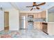 Well-lit kitchen featuring stainless steel appliances and ample cabinet space at 5210 Newton S Ave, Gulfport, FL 33707