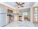 Bright kitchen with stainless steel appliances and breakfast bar area at 5210 Newton S Ave, Gulfport, FL 33707