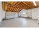 Interior view of the garage, with an exposed-beam ceiling at 5841 Bay Pines Lakes Blvd, St Petersburg, FL 33708