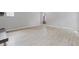 Bright living room featuring light wood floors and a cozy fireplace at 5841 Bay Pines Lakes Blvd, St Petersburg, FL 33708