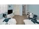 Comfortable bedroom with twin beds, storage, and a neutral color palette at 7787 39Th N Ter # 7787, St Petersburg, FL 33709