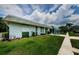 Charming single-story home with well-maintained landscaping and a cozy patio area at 7787 39Th N Ter # 7787, St Petersburg, FL 33709