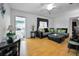 Comfortable living room featuring a large sofa and bright, airy ambiance at 7787 39Th N Ter # 7787, St Petersburg, FL 33709