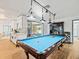 Game room features a pool table and an open floor plan at 1943 Jeffords St, Clearwater, FL 33764