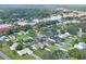 Aerial view of the neighborhood with a focus on the property and its surroundings at 7988 Ravenwood Cv, Spring Hill, FL 34606