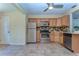 Updated kitchen featuring stainless steel appliances and light wood cabinetry at 5210 Newton S Ave, Gulfport, FL 33707