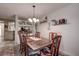 Bright dining room with wood table and chairs at 2599 Dolly Bay Dr # 308, Palm Harbor, FL 34684