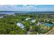 Community overview showcasing waterfront views and lush greenery at 2599 Dolly Bay Dr # 308, Palm Harbor, FL 34684