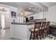 Kitchen with breakfast bar, granite counters, and stainless steel appliances at 2599 Dolly Bay Dr # 308, Palm Harbor, FL 34684