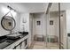 Modern bathroom with granite sink and walk-in closet at 2599 Dolly Bay Dr # 308, Palm Harbor, FL 34684