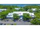 Aerial view of community, showcasing building and parking at 2599 Dolly Bay Dr # 308, Palm Harbor, FL 34684