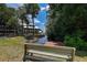 Serene waterfront view from a community bench at 2599 Dolly Bay Dr # 308, Palm Harbor, FL 34684