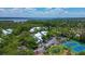 Community overview with tennis courts and waterfront views at 2599 Dolly Bay Dr # 308, Palm Harbor, FL 34684