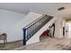 Unique staircase with dark wood railing at 2599 Dolly Bay Dr # 308, Palm Harbor, FL 34684