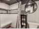 Clean bathroom with tiled shower and built-in bench at 2599 Dolly Bay Dr # 308, Palm Harbor, FL 34684