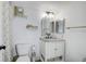 Simple bathroom with granite countertop and white vanity at 2599 Dolly Bay Dr # 308, Palm Harbor, FL 34684