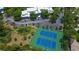 Two tennis courts, pond, and community building at 2599 Dolly Bay Dr # 308, Palm Harbor, FL 34684
