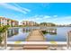 Wooden community dock extending over calm water at 19029 Us Highway 19 N # 12B, Clearwater, FL 33764