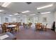 Community game room with tables at 19029 Us Highway 19 N # 12B, Clearwater, FL 33764